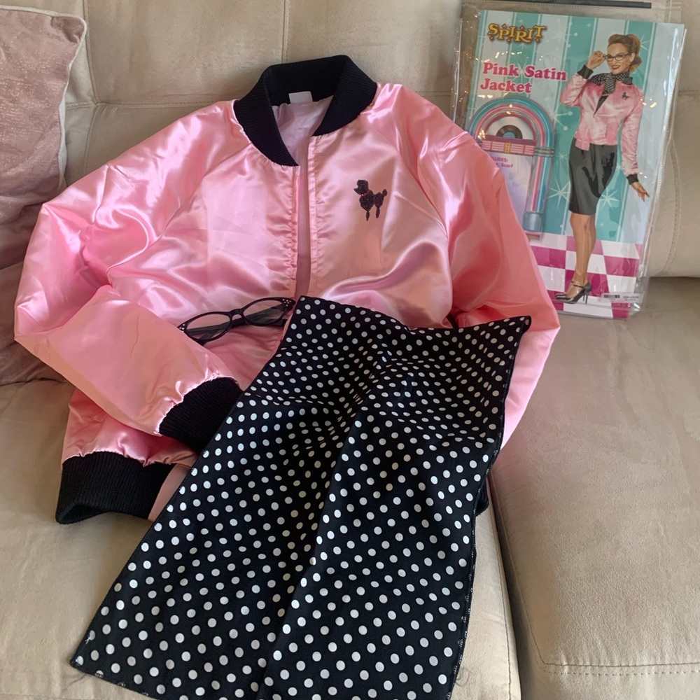 Pink lady Halloween costume. Includes glasses, scarf, and jacket